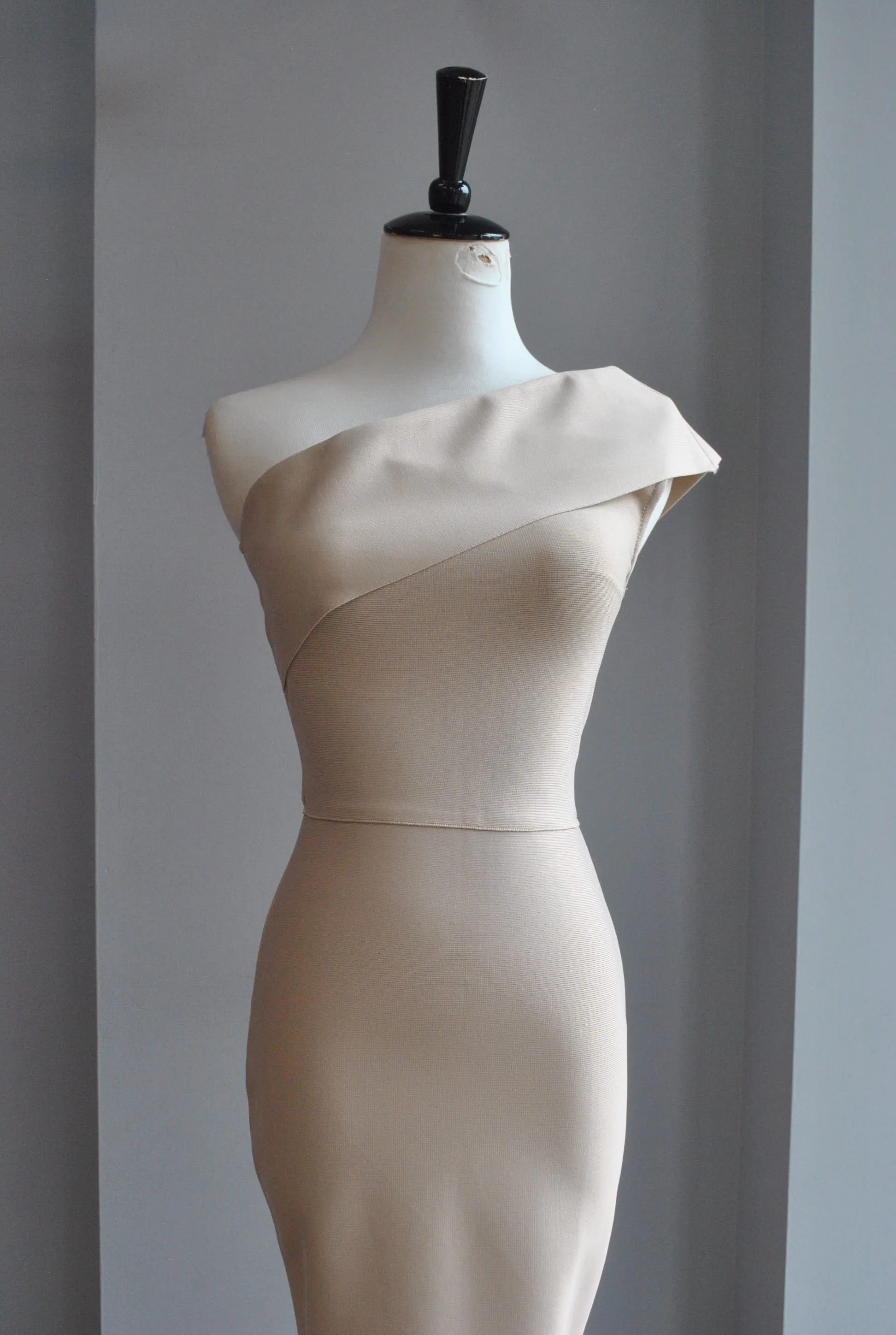 CLEARANCE - BEIGE ASYMMETRIC MIDI BANDAGE DRESS