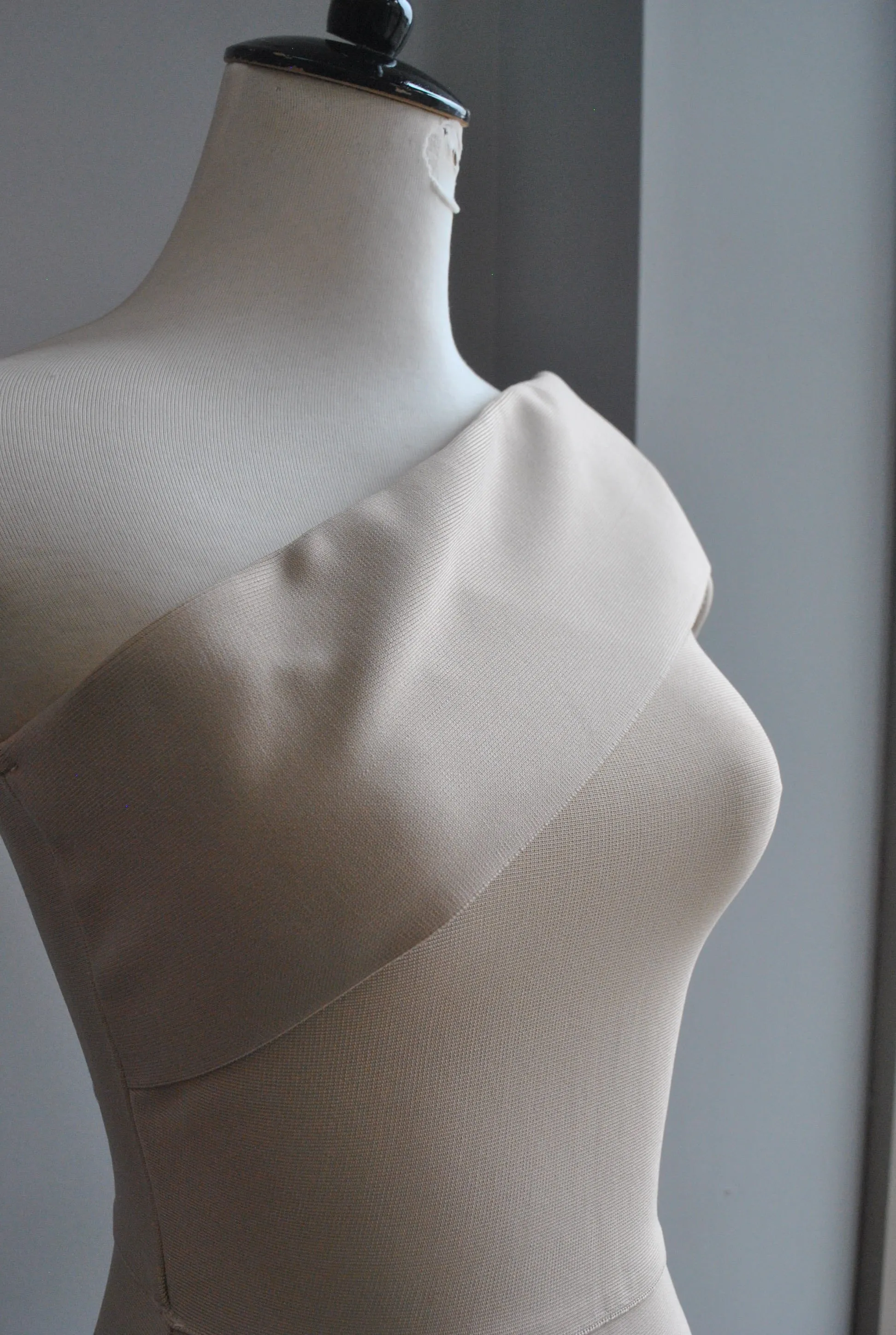 CLEARANCE - BEIGE ASYMMETRIC MIDI BANDAGE DRESS